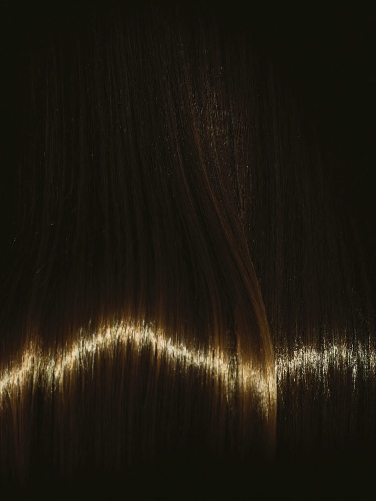 Translucent radiance gloss glazing over reflective hair
